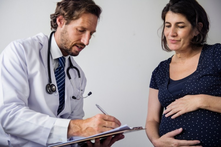 Image Source: https://elements.envato.com/pregnant-woman-having-fetal-monitoring-by-doctor-PANG3AD/preview