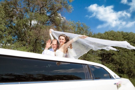 bride groom in a limo